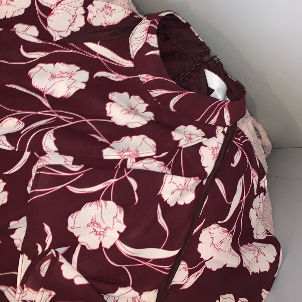 A dress with pink flowers